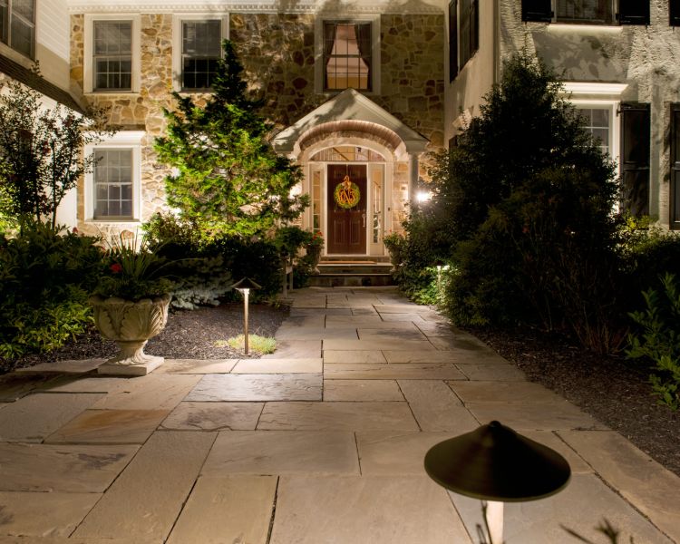 Lighting (Front Courtyard) Path lights and up-lighting to wash foundation of house