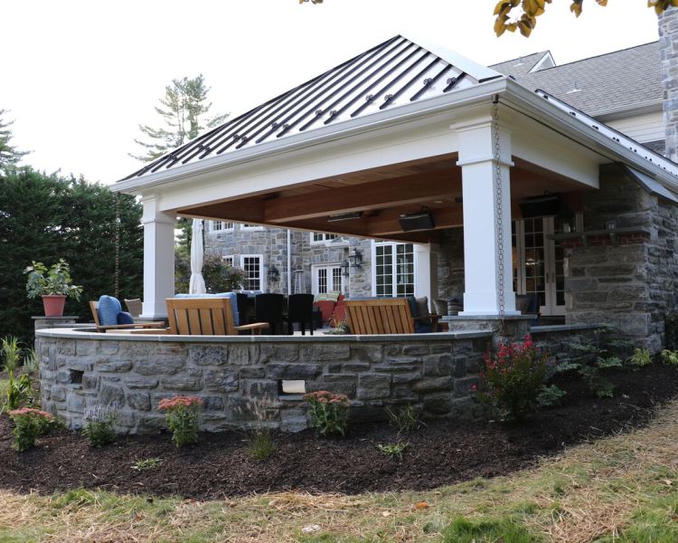 Structures: Roofed extension of house with metal roofing