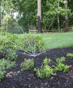 Custom deck with hot tub built in | Landscape Design Companies like Burkholder design and build beautiful custom decks