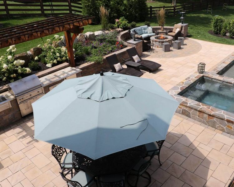 Techo-Bloc Blu 60 Patio with Techo-Bloc Flagstone Paver around firepit