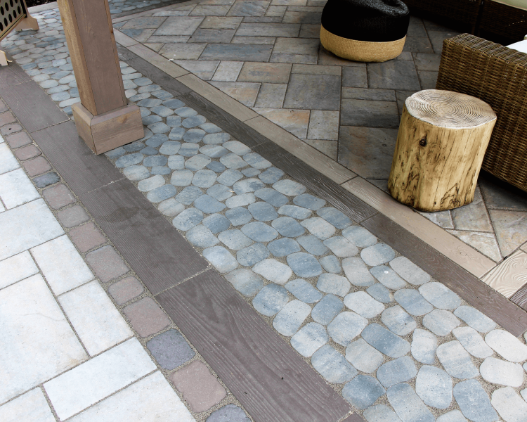 Mixed material walkway and floor of a pavilion and seating area - Burkholder Landscape