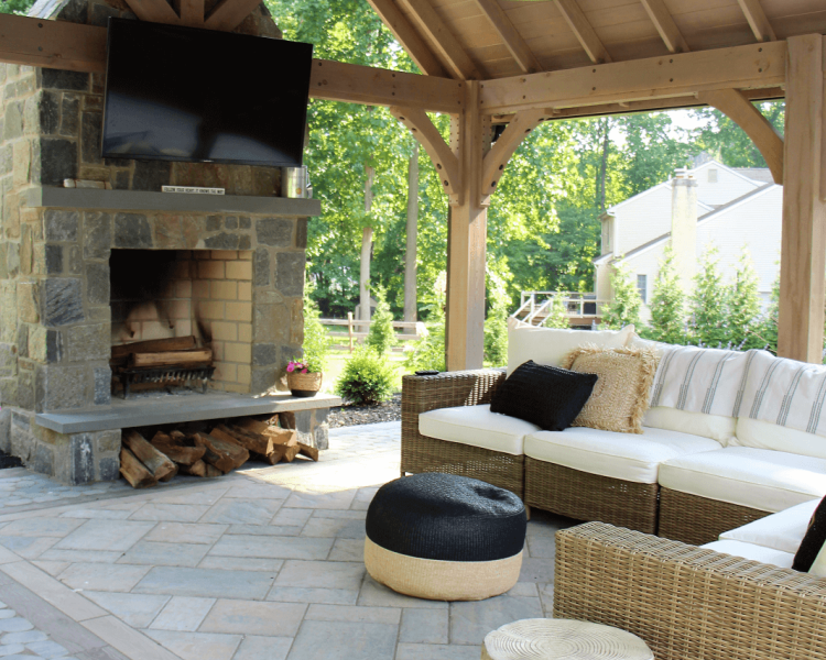 Pavilion with fireplace, TV, and seating area -Burkholder Landscape