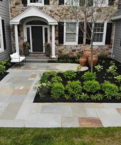 flagstone walkway to patio of home 800