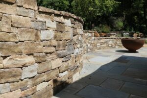 Natural stone retaining wall | retaining walls | Burkholder Brothers