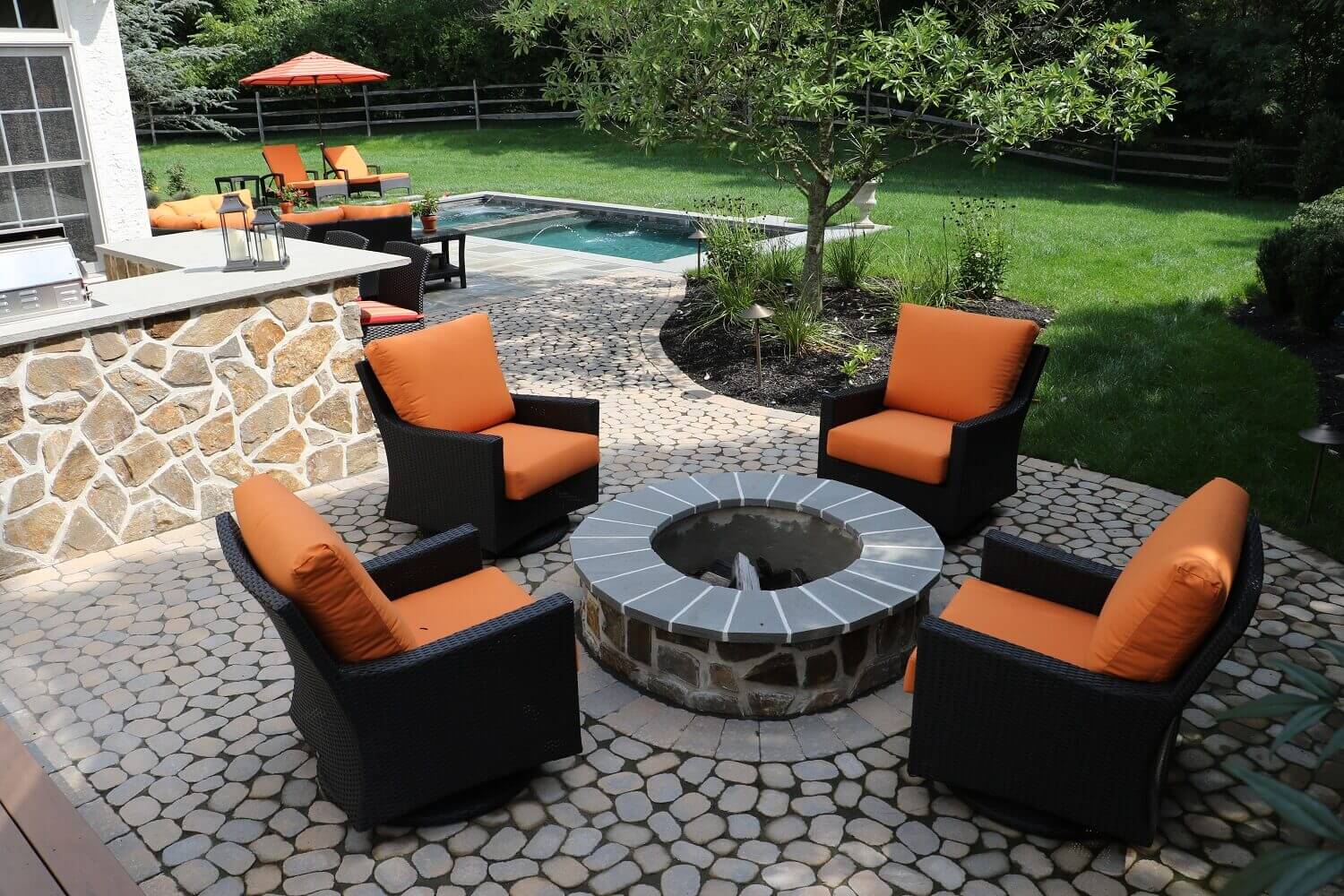 techo blok patio with firepit and chairs
