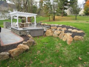 Boulder retaining wall | retaining walls | Burkholder Brothers