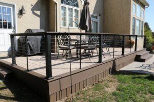 Raised Composite Deck | sloped backyard | Burkholder Brothers