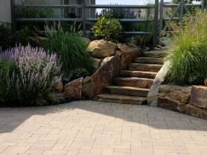 natural stone steps | sloped backyard | Burkholder Brothers