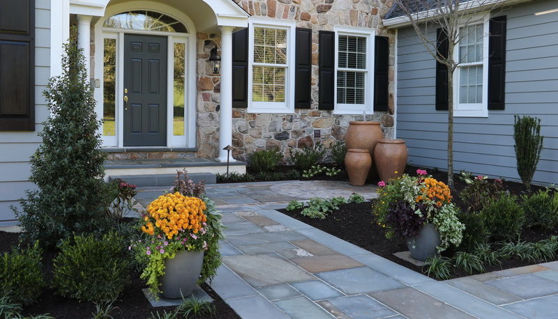 Sakiew Front Entrance Courtyard with Jar Fountains | Front Yard Landscaping | Burkholder Brothers