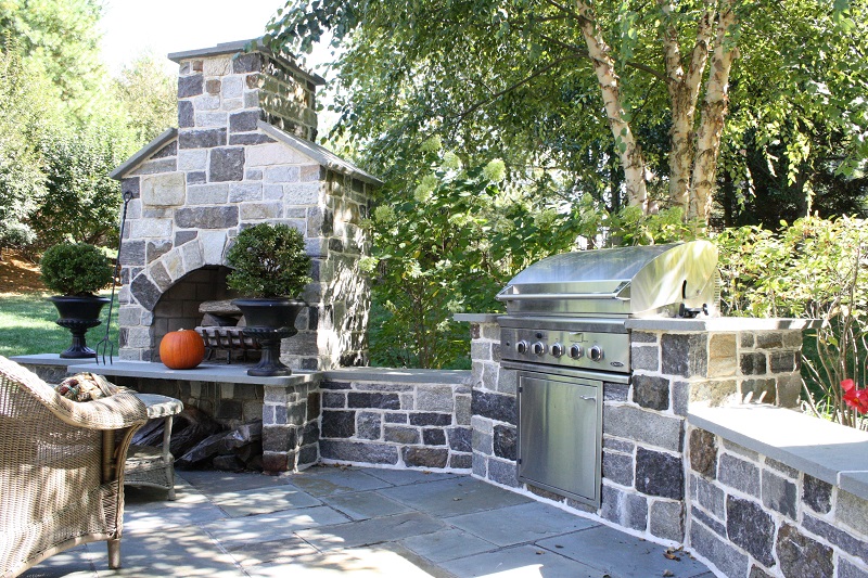 Outdoor kitchen with grill and fireplace | Your Outdoor Space | Burkholder Brothers