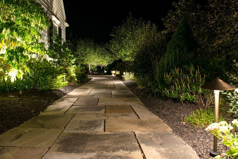 Path lighting in landscape during night | Benefits of outdoor lighting | Burkholder Brothers