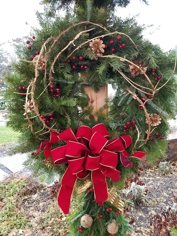 Burkholder Wreath with red bow and gold trim