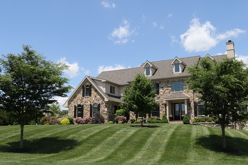 Front view of house and lawn | professional turf care | Burkholder Landscape