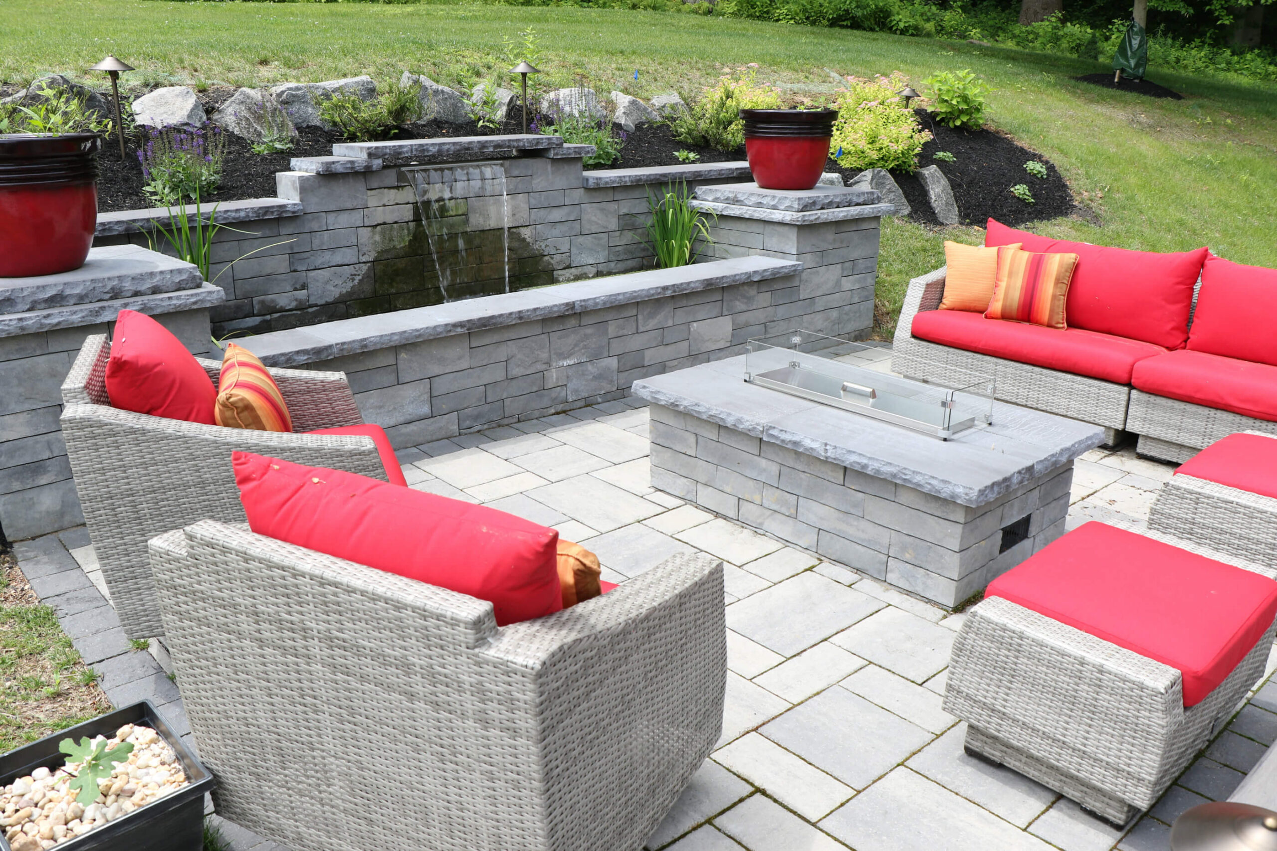  Rectangular gas firepit with seating and fountain/wallFireplaces and Firepits Options |  Burkholder Landscape