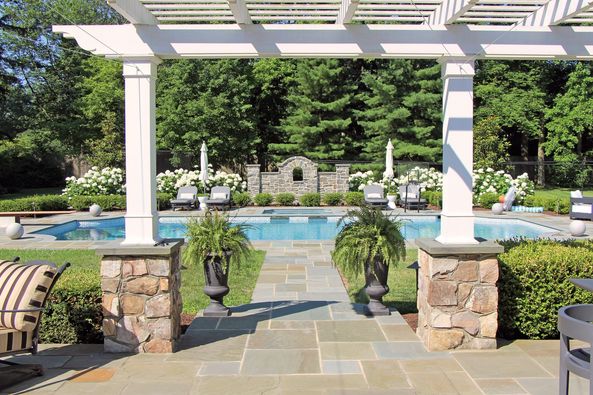 pergola and walkway to a custom pool | Burkholder's Landscape Design Process