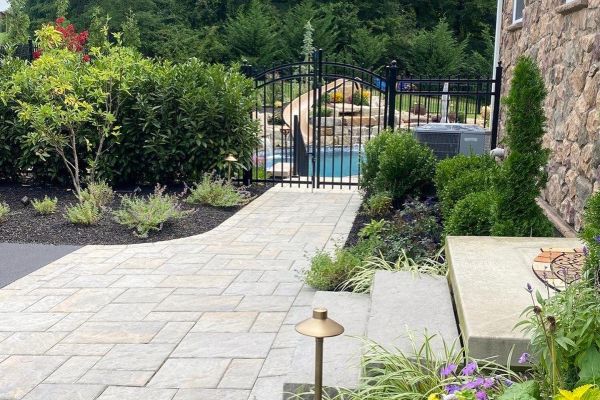 Walkway patio of Champlain Gray Techo-Bloc Blu 60 pavers - Pool and Patio Retreat - New Projects by Burkholder Landscape