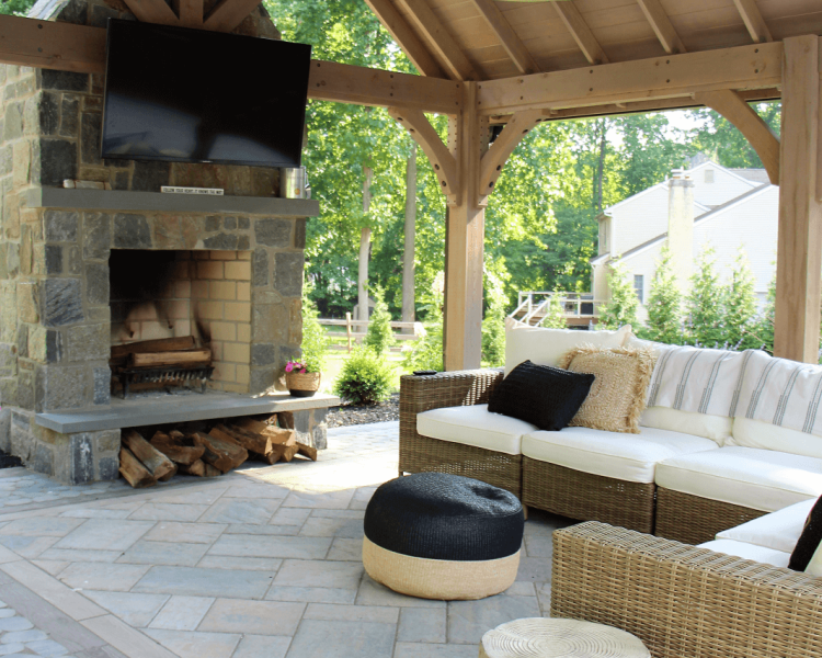Pavilion with fireplace, TV, and seating area -Burkholder Landscape