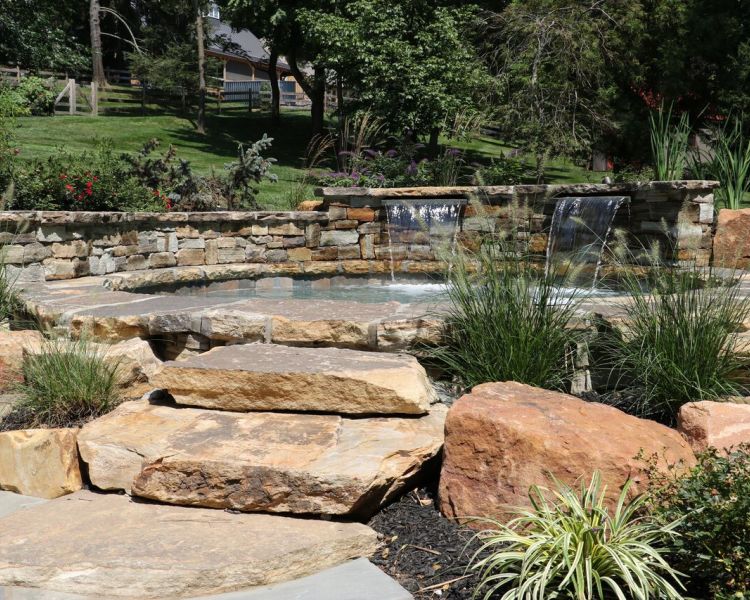 Landscaping: Ornamental Grasses, Perennials and Specimen Shrubs around Natural Stone Spa