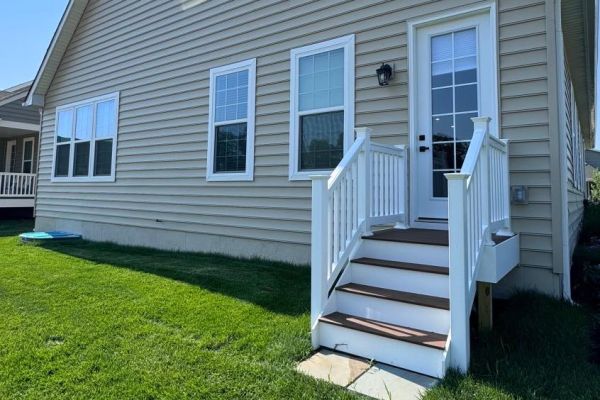 Pool seat walls and steps using Techo-Bloc 6&rdquo; Mini Creta Architectural caps in beautiful chestnut brown - Pool and Patio Retreat - New Projects by Burkholder Landscape
